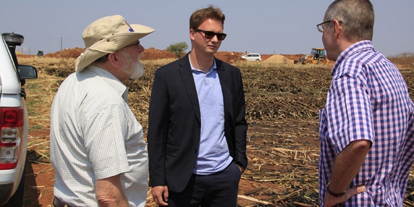 Aug 2014 Mission — visit to a recently harvested sugar field. From left: Jan van Kamp, KE1 Team Leader; Jakob Zeidler, Project Manager, Human Dynamics; and Steven Wright , KE4 Business Development Advisor.